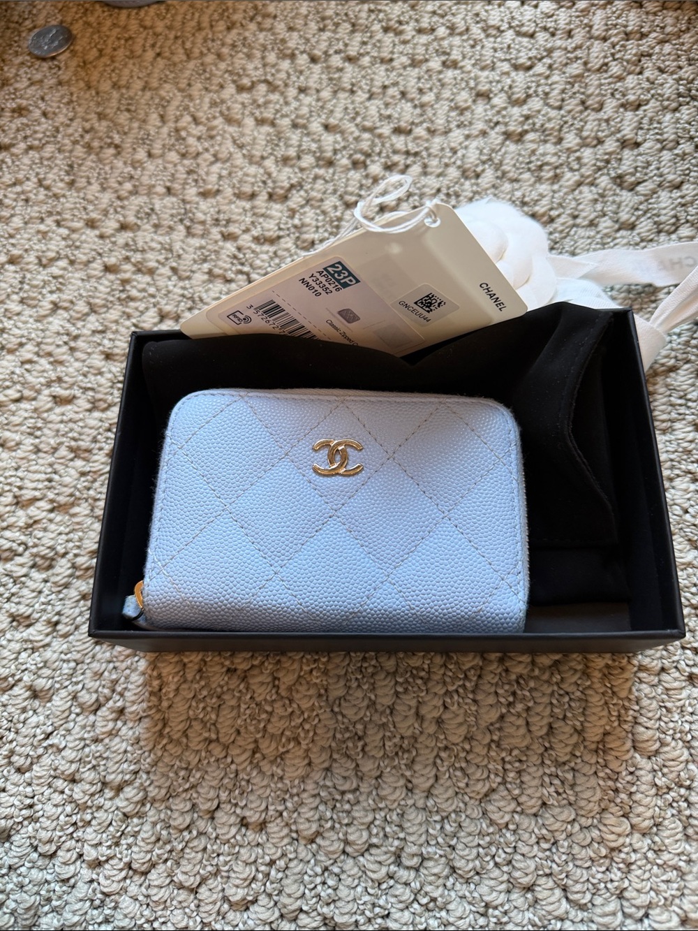 CHANEL Quilted Small Zip Wallet in Pale Blue with Gold CC